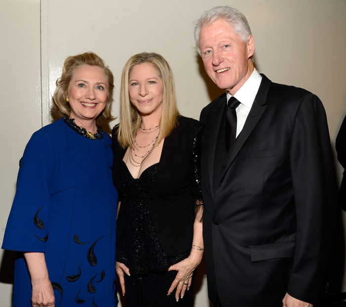 Hillary and Bill Clinton with Streisand, photo by Kevin Mazur