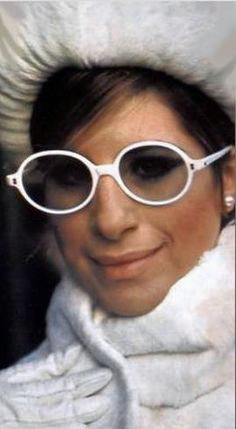 Streisand in white outfit